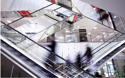 Escalators in a retail space.