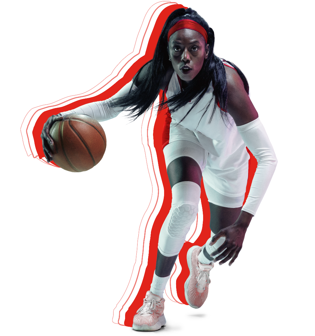 Female basketball player dribbling